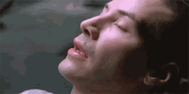 Neo, eyes closed, the moment a combat program finishes loading into his mind.